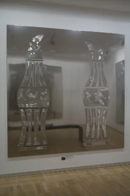 Dandelions in Coca Cola Bottles